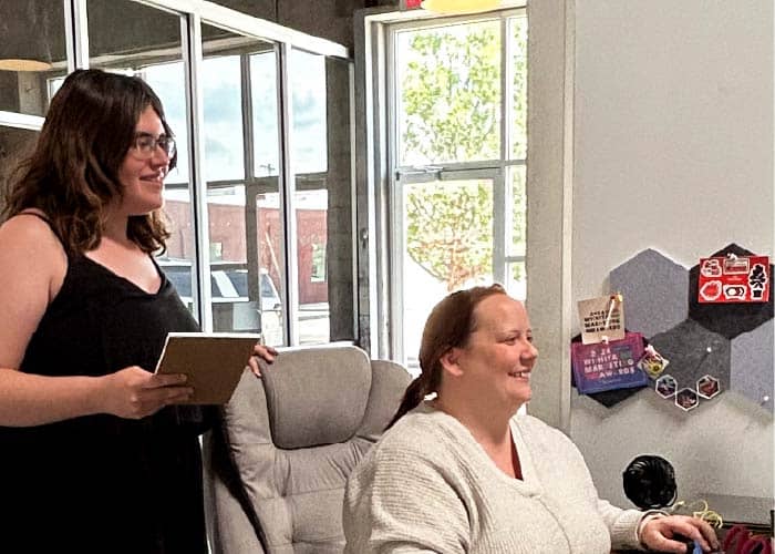 Digital Marketing Specialist collaborating with Designer